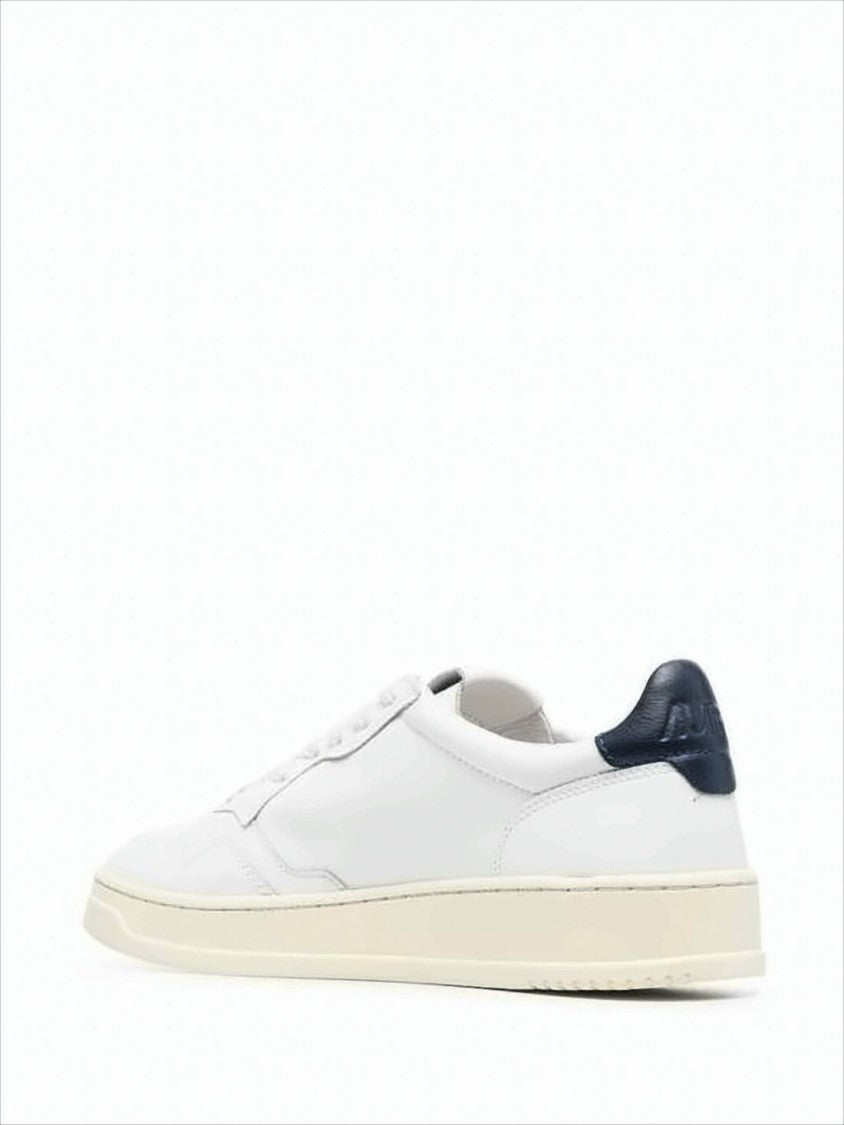 Autry Minimalist Low-Top Sneakers With Perforated Detailing
