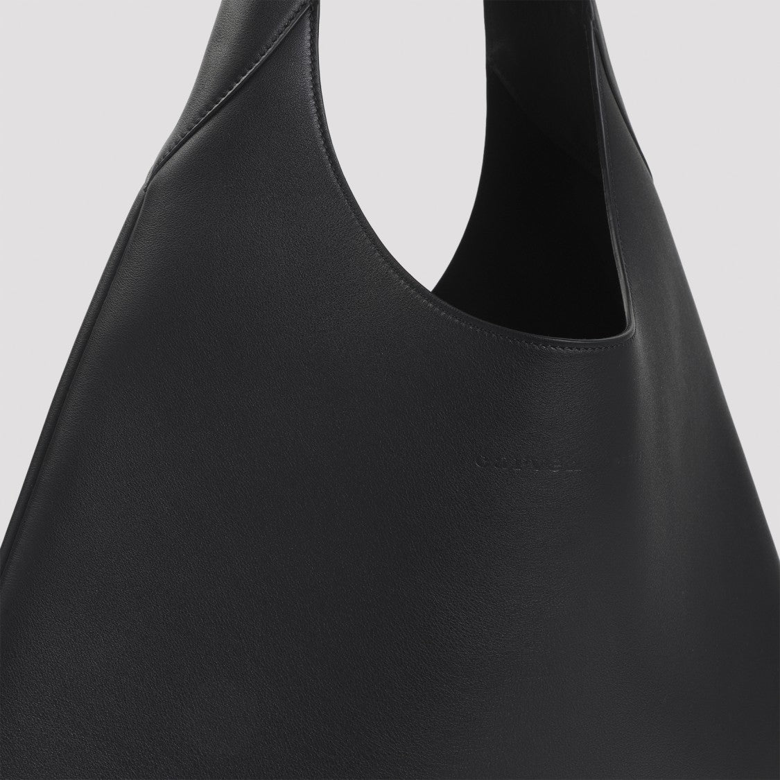 Carven Minimalist Leather Shoulder Bag With Triangular Silhouette