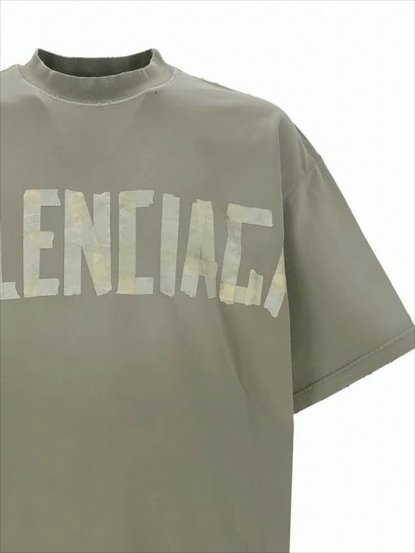 Balenciaga Distressed Logo Graphic Tee With Relaxed Fit