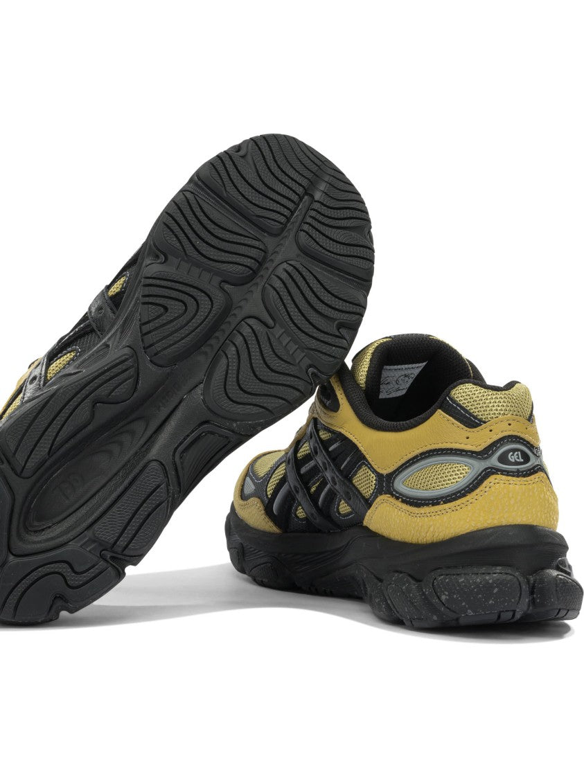 Asics Sporty Yellow And Black Sneakers With Textured Sole