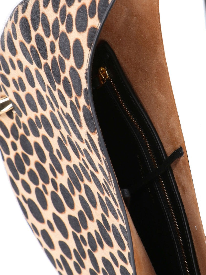 Tory Burch Crescent-Shaped Handbag With Bold Spotted Pattern