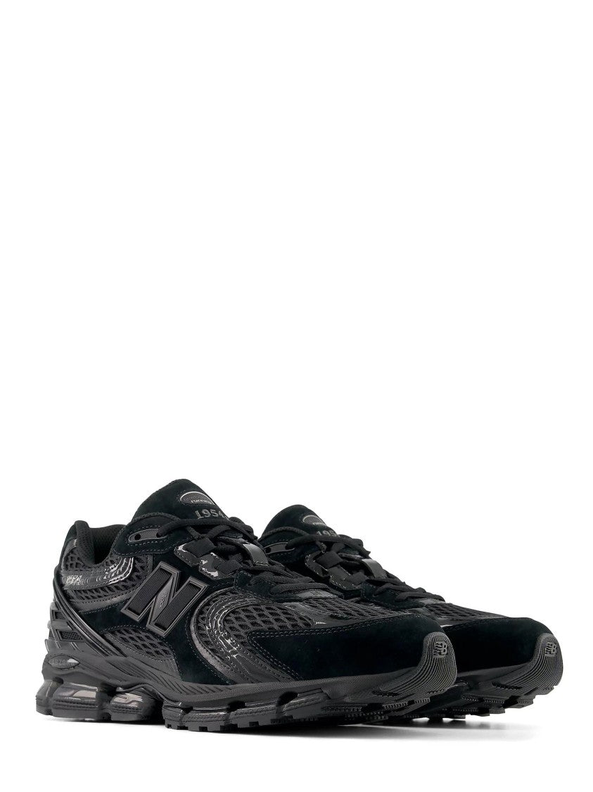 New Balance Textured All-Black Sneakers With Cushioned Sole And Iconic Branding