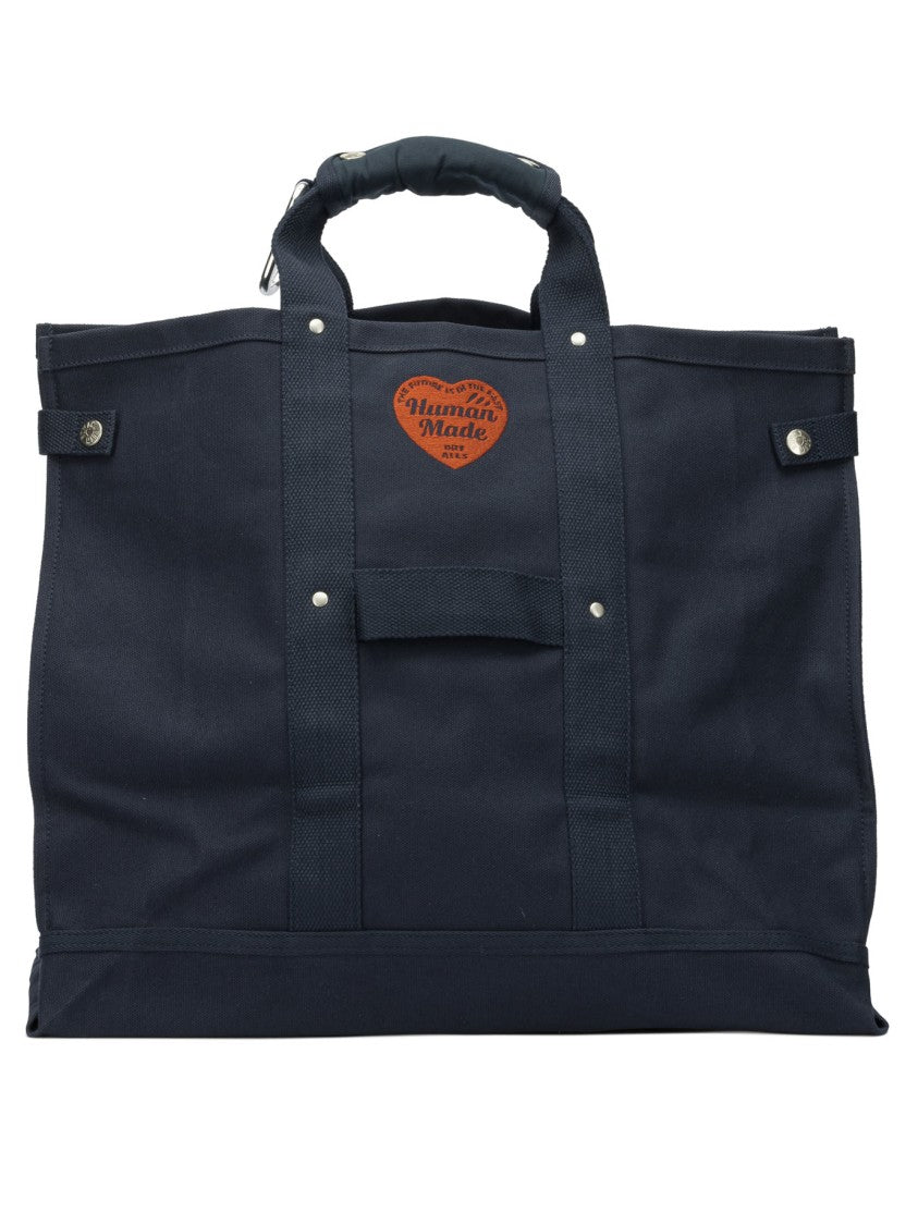 Human Made Durable Canvas Travel Bag With Heart Motif And Integrated Pocket