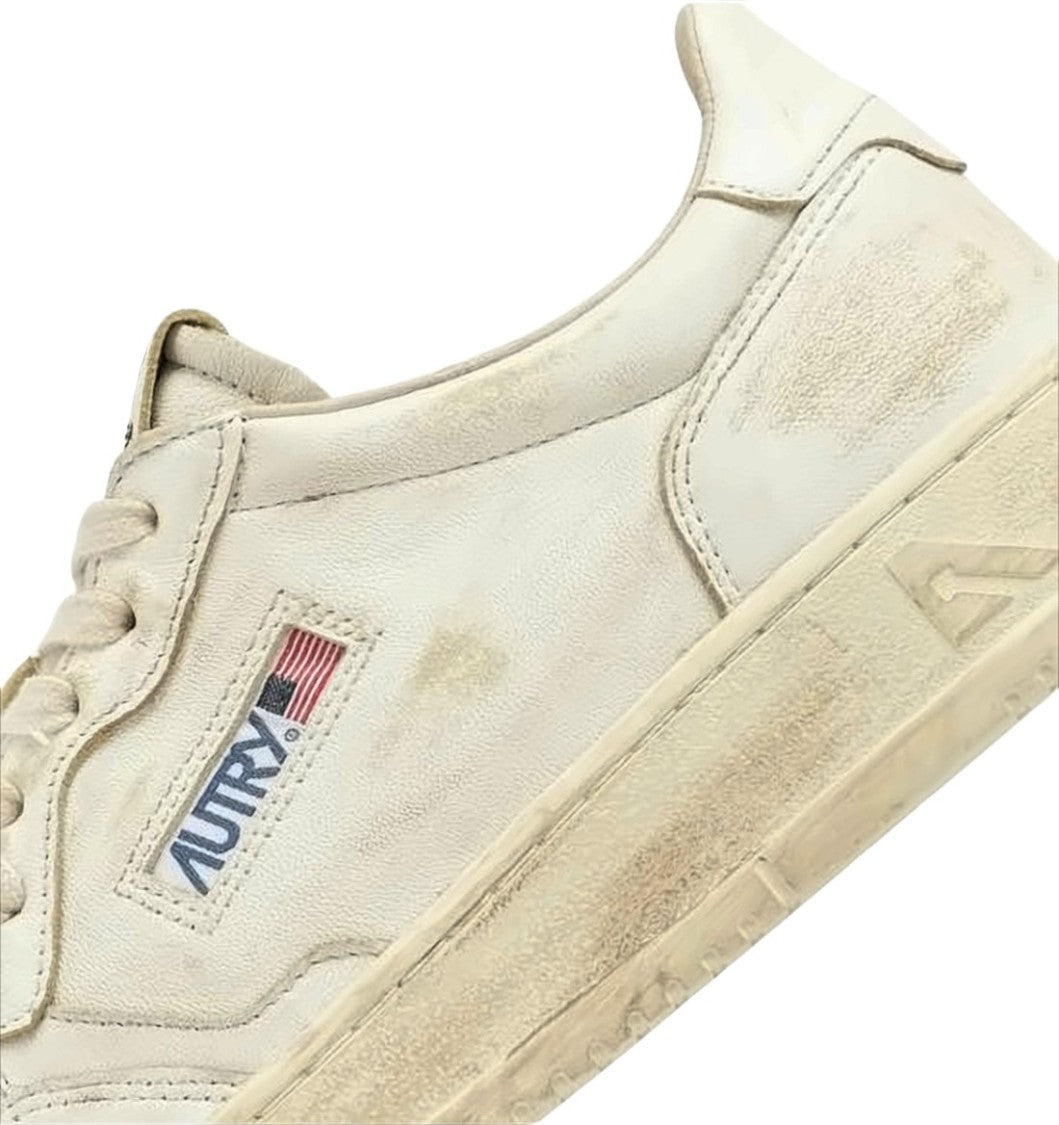 Autry Vintage-Inspired Off-White Sneakers With Distressed Finish