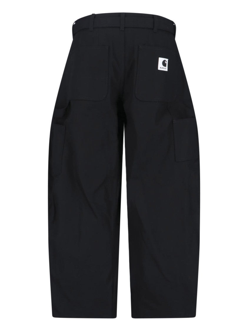 Sacai Duck Wide-Leg Pants With Curved Silhouette And Buckle Belt