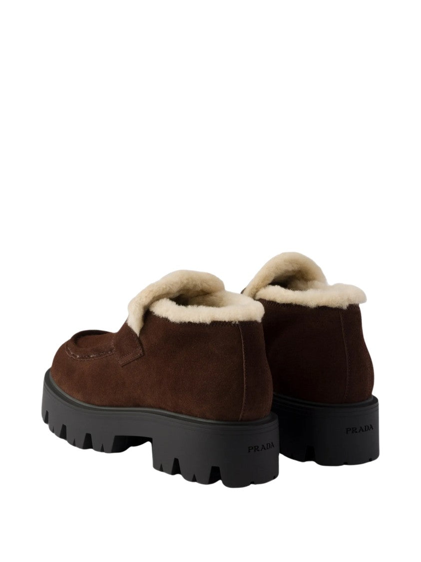 Prada Stride Shearling Lined Suede Boots