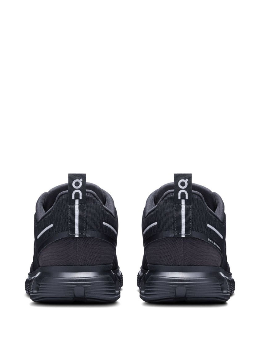 On Low-Profile Black Sneakers With Reflective Accents