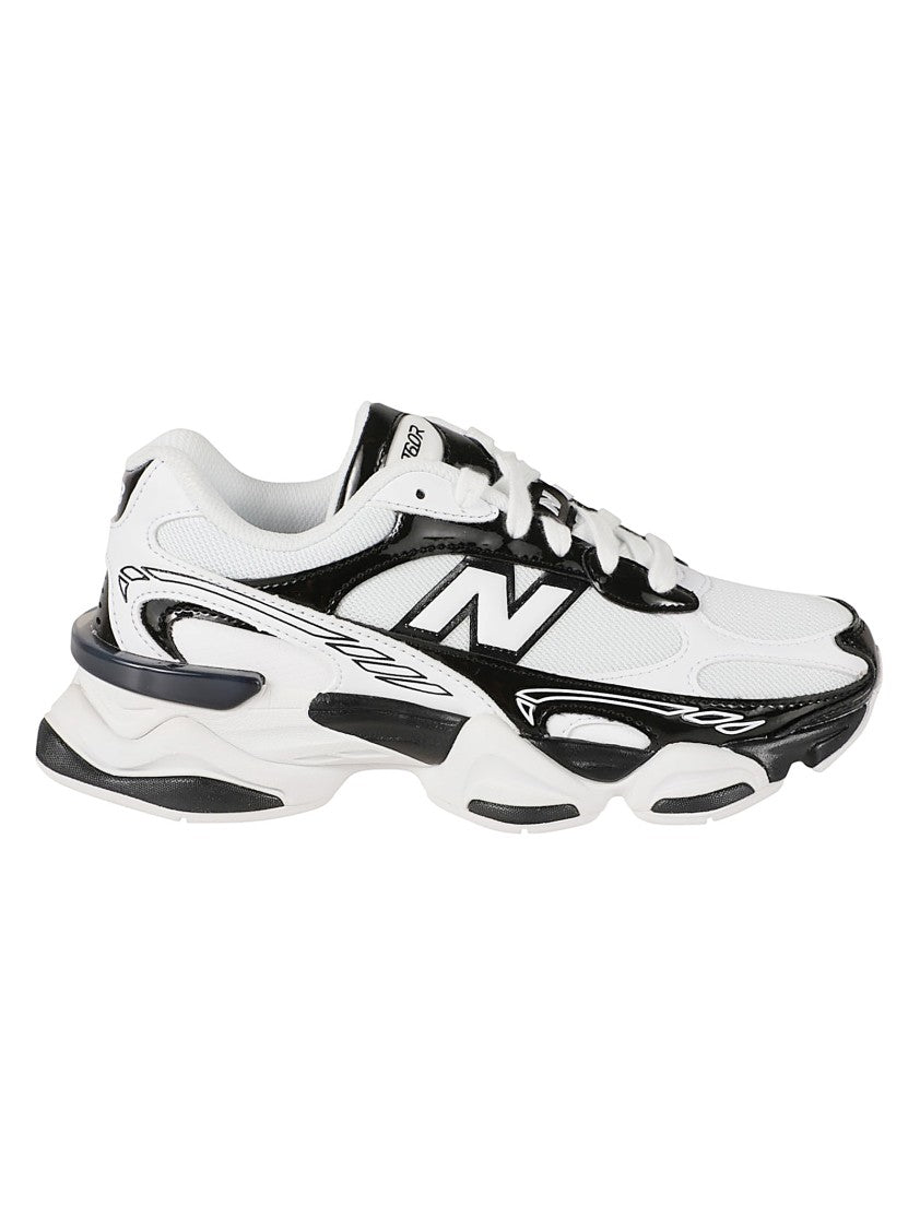 New Balance Dynamic Sneakers With Glossy Black Accents And Sculpted Sole