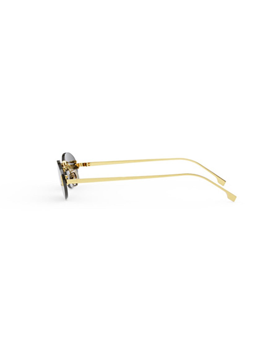 Fendi Oval Metal Sunglasses With Gold Finish And Slim Temples