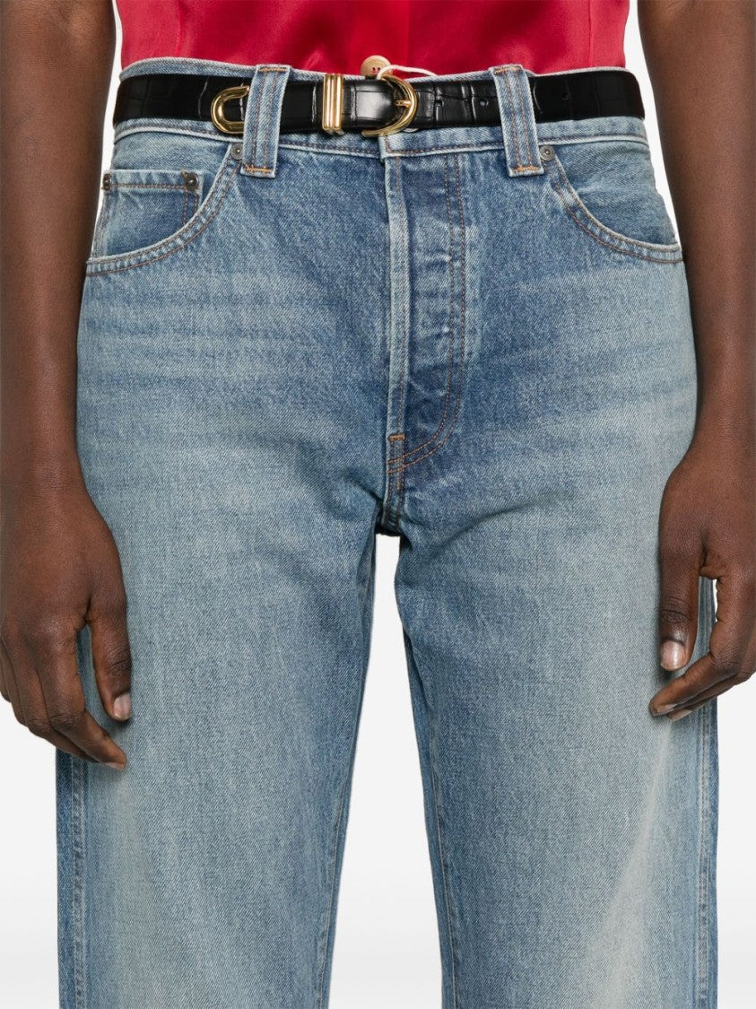 Khaite Relaxed Bow Leg Jeans In Faded Denim