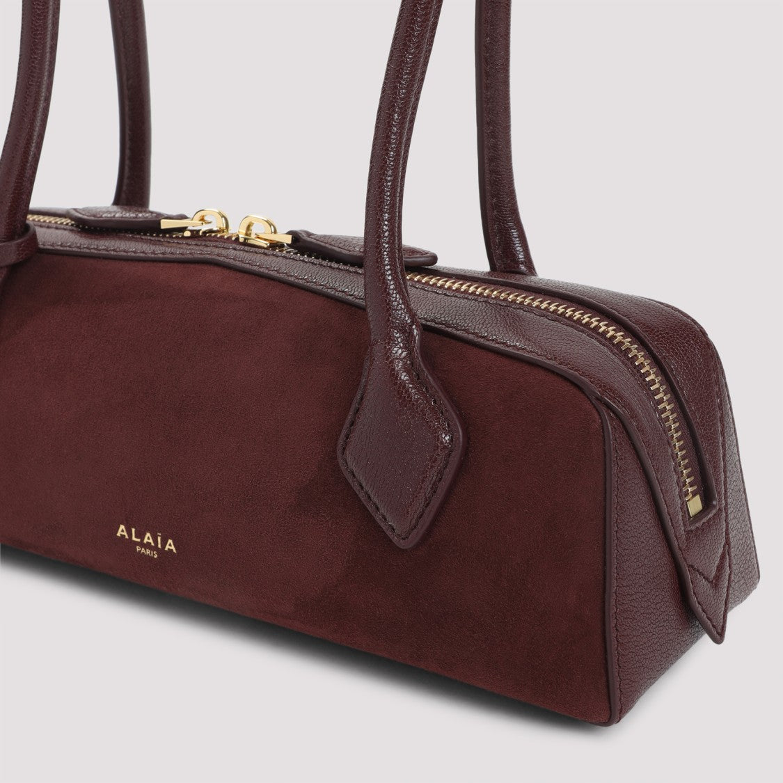 Alaïa Suede Shoulder Bag With Gold-Tone Accents