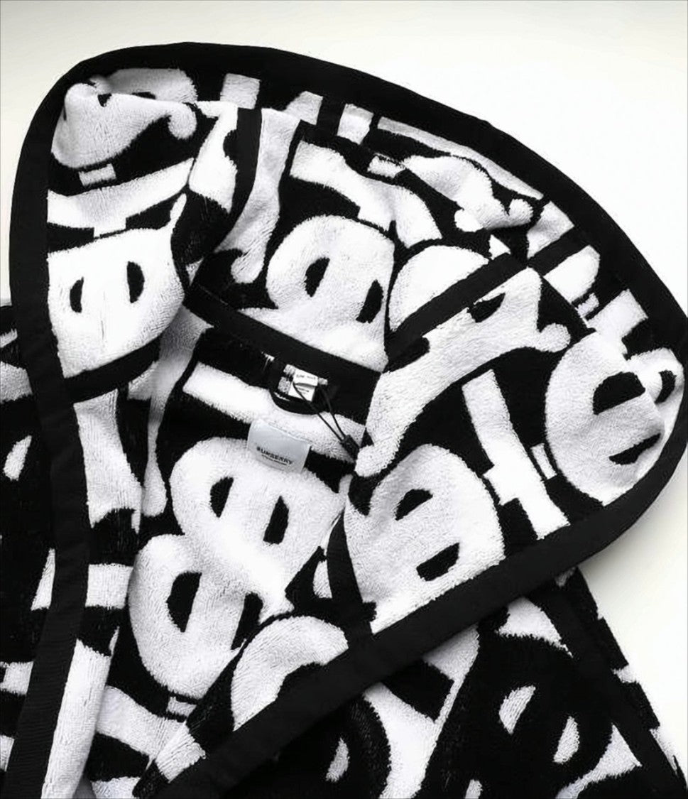 Burberry Graphic Patterned Cape With Hood And Trim