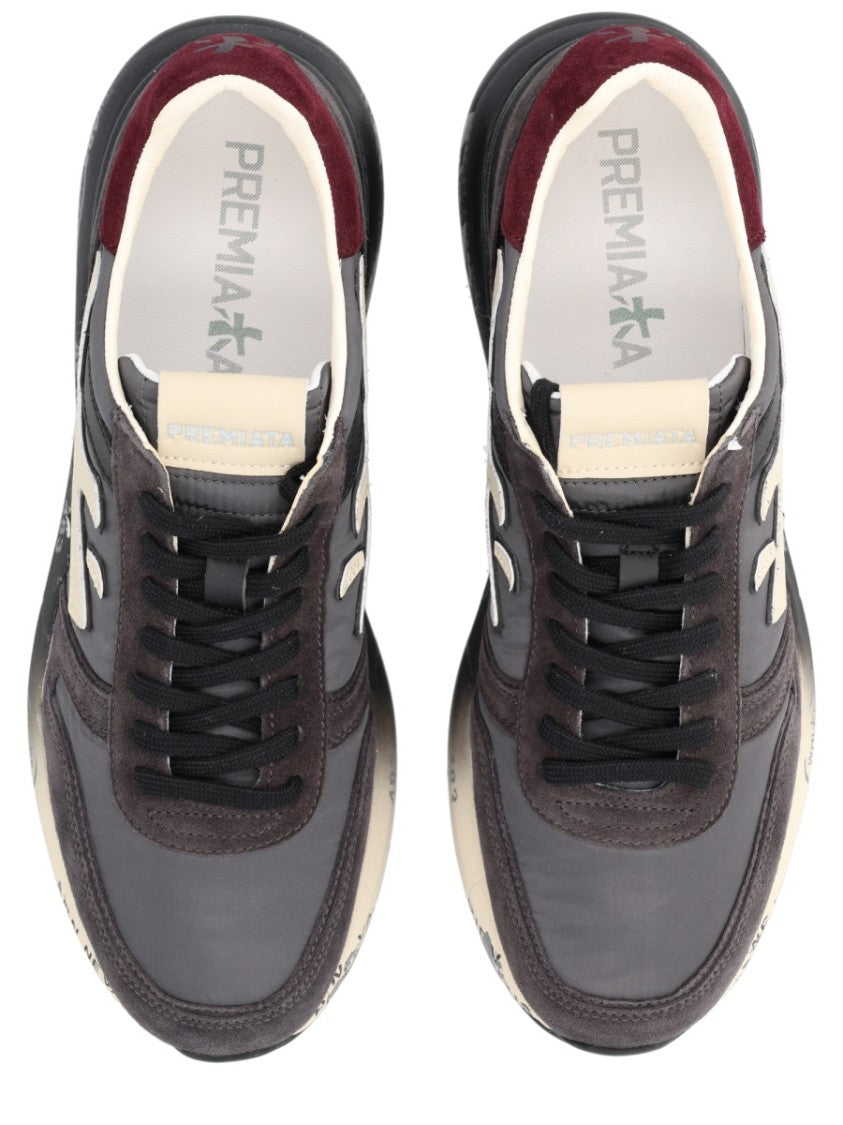 Premiata Chunky Sole Black Sneakers With Logo Accent And Padded Collar