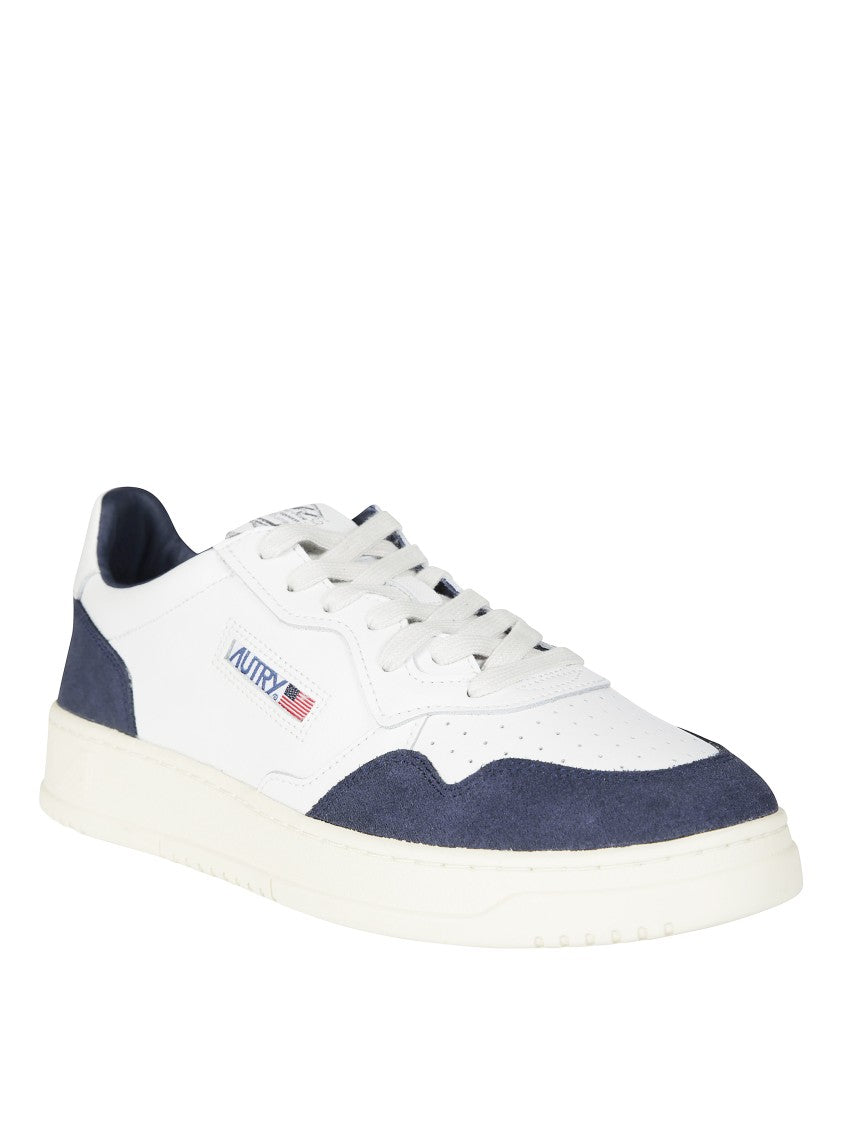 Autry Minimalist Navy Blue Suede Low-Top Sneakers