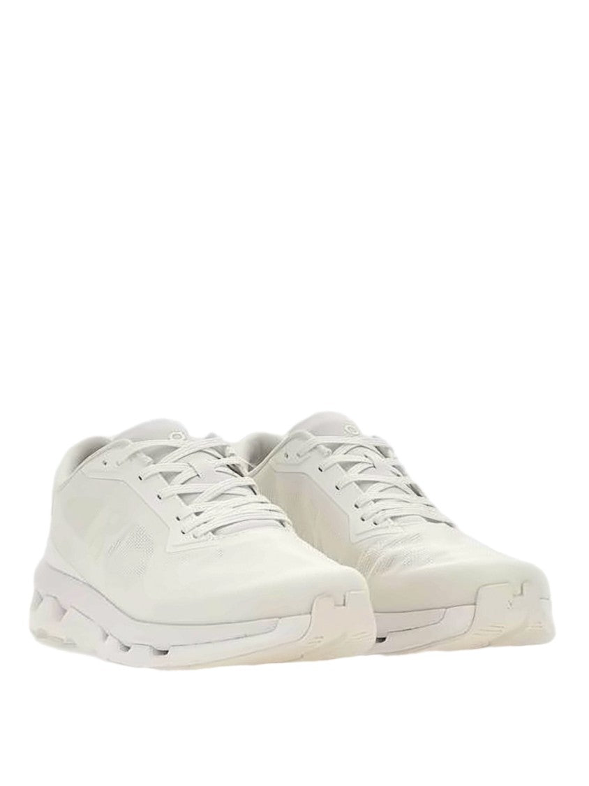 On Running Minimalist White Sneakers With Rubber Segmented Sole