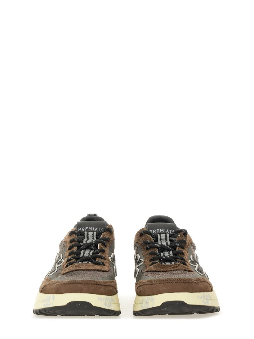 Premiata Layered Brown Sneakers With Textured Accents And Cream Sole