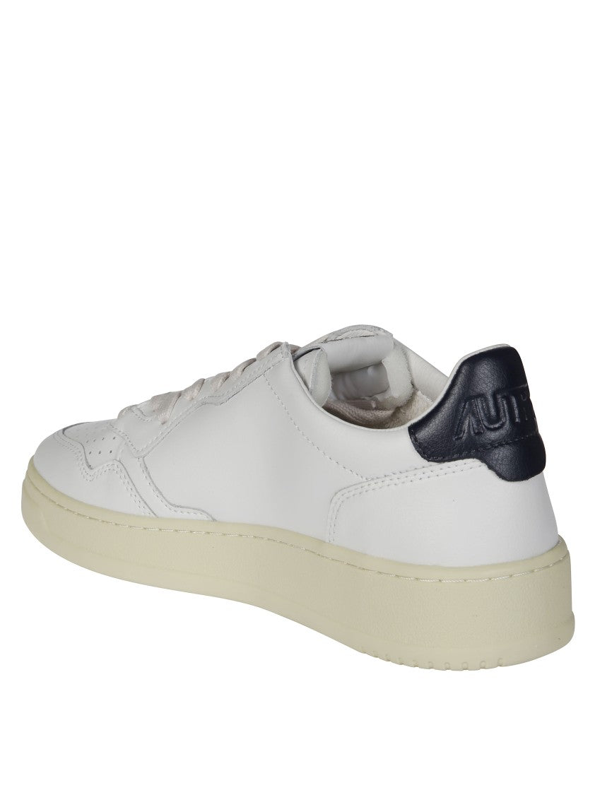 Autry White Medalist Low Navy Heel Sneakers