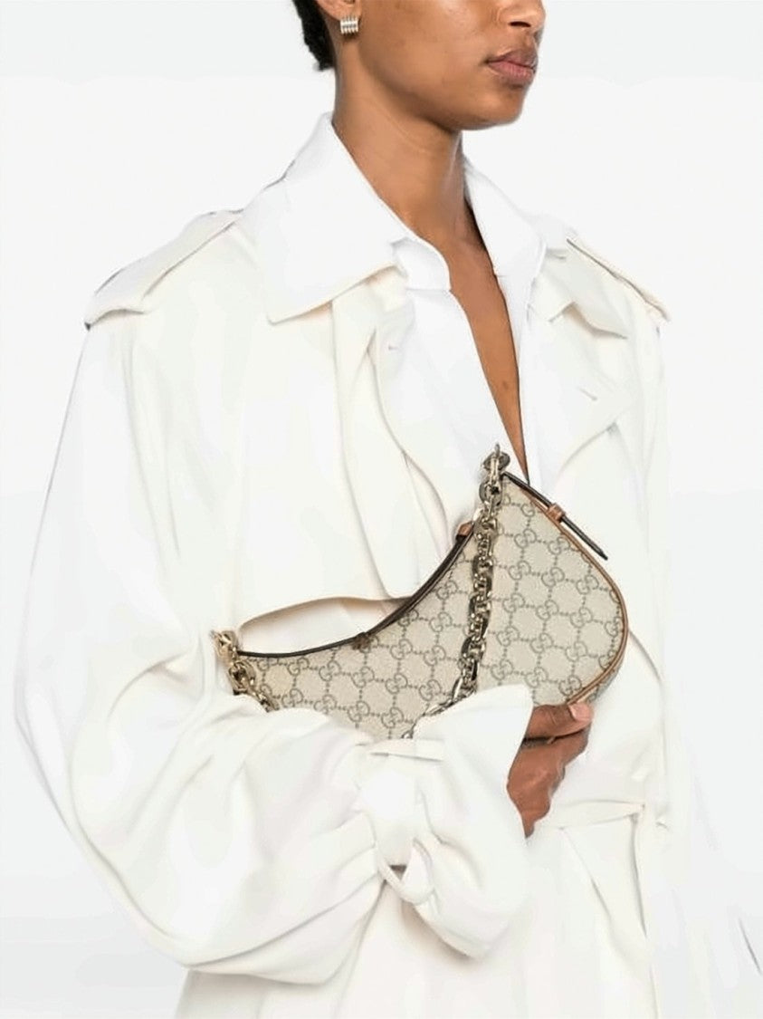 Gucci Curved Monogram Shoulder Bag With Gold-Tone Chain Strap