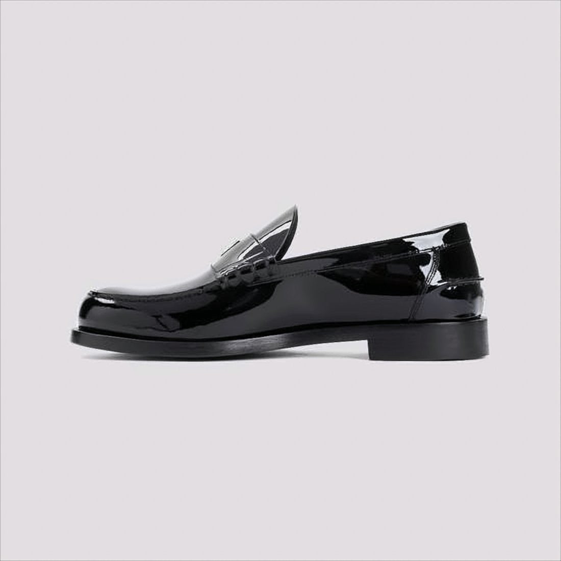 Givenchy Glossy Black Moc Toe Loafers With Metallic Details