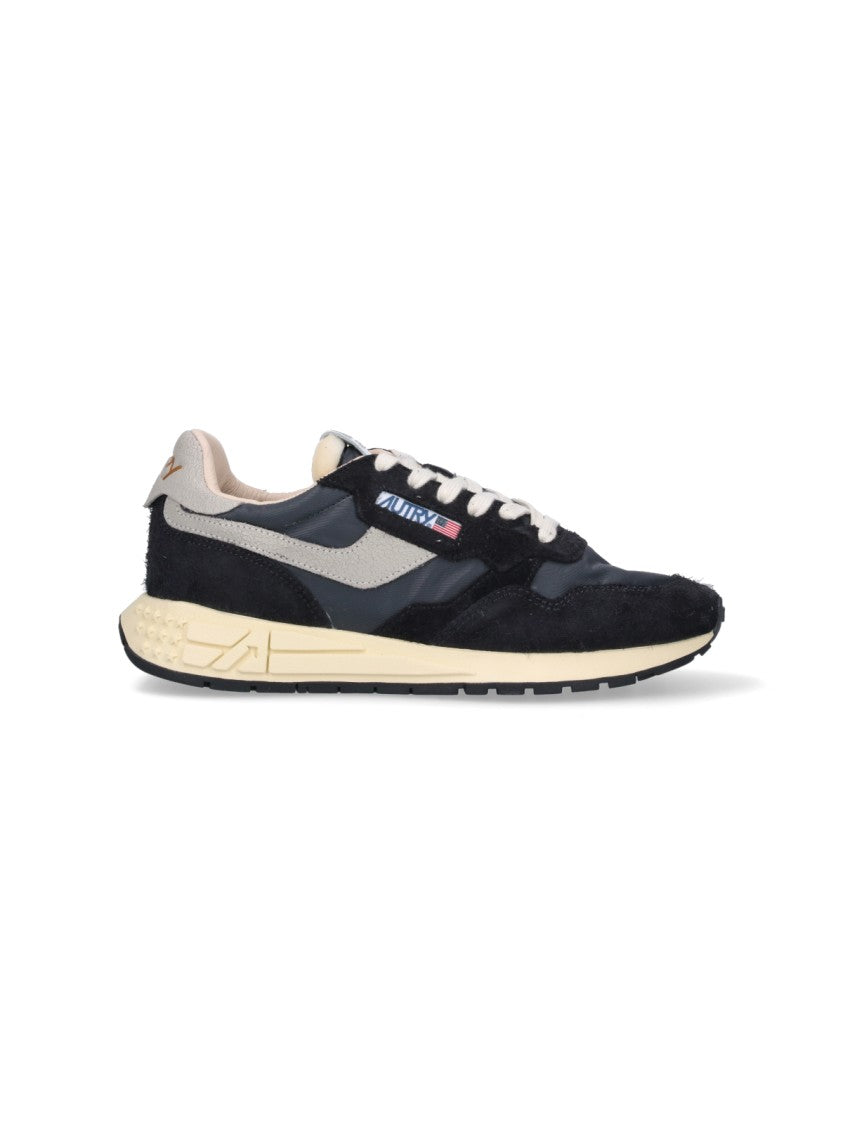 Autry Streamlined Black Sneakers With Minimalist Design