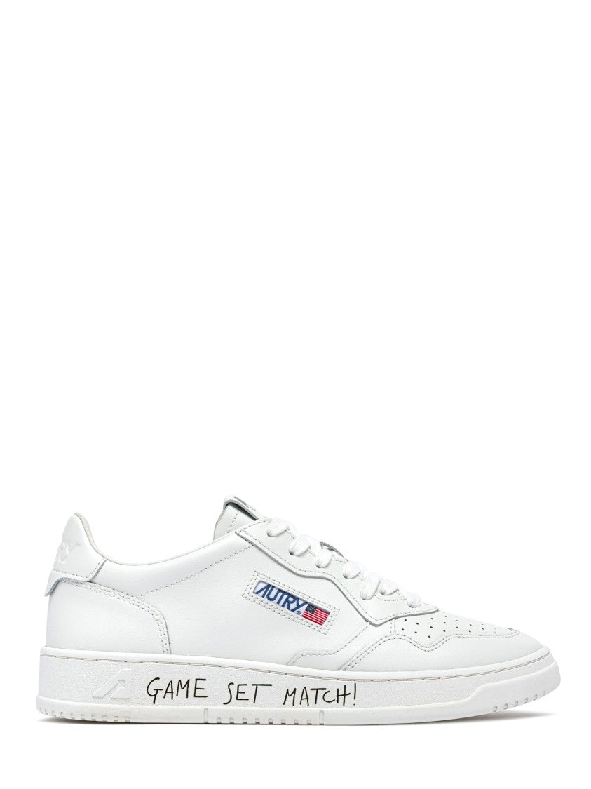Autry Low-Top Leather Sneakers With Perforated Detailing And Unique Sole Accents