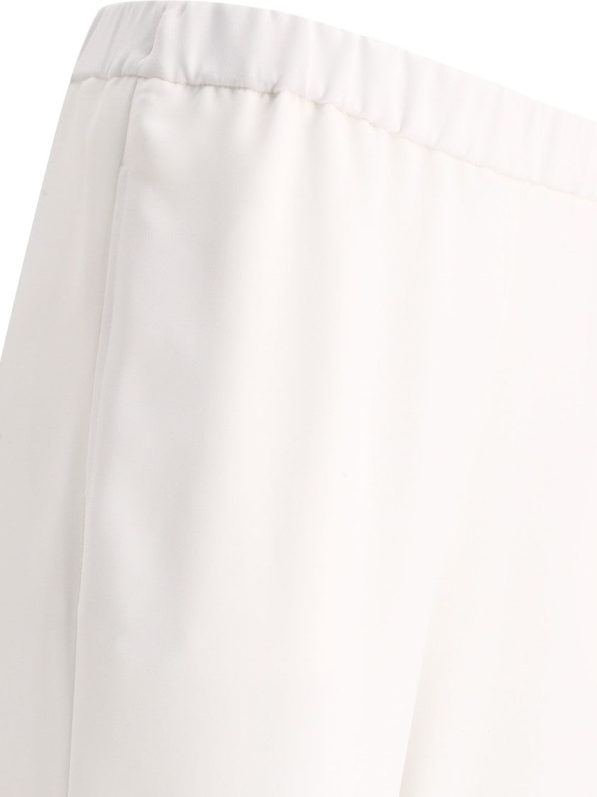 F.It Relaxed Fit White Trousers With Minimalist Aesthetic