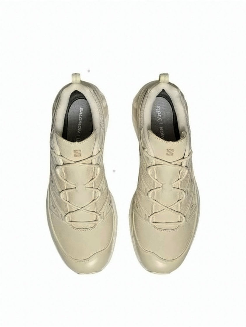 Salomon Streamlined Neutral-Tone Sneakers With Textured Rubber Sole