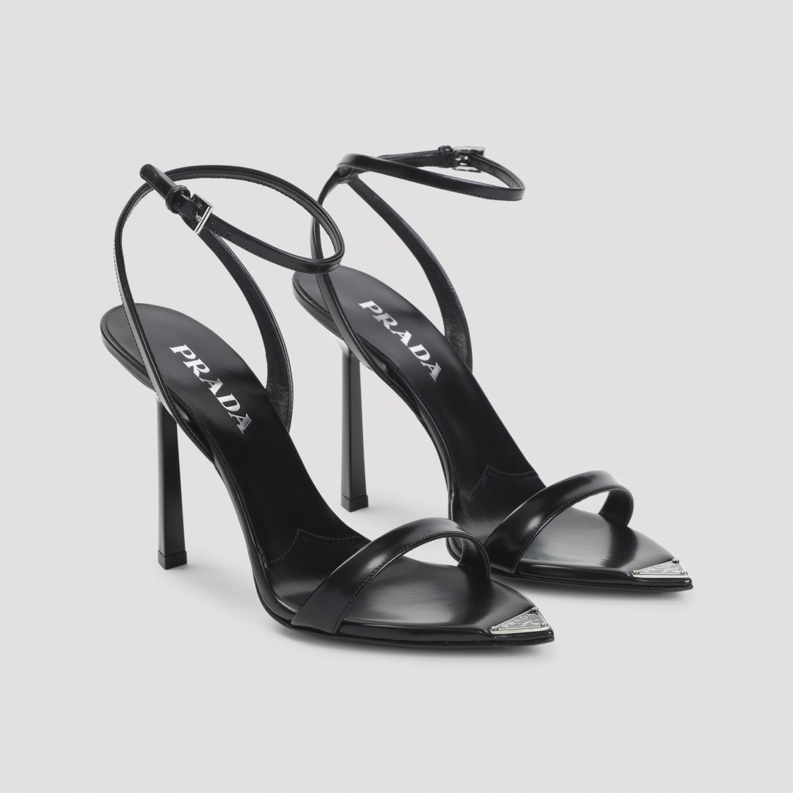 Prada Pointed Toe Sandals With Adjustable Ankle Strap And Metallic Logo