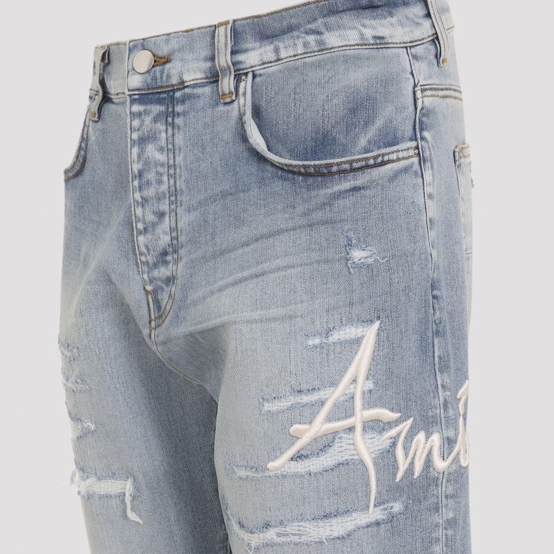 Amiri Distressed Light Blue Jeans With Modern Fit