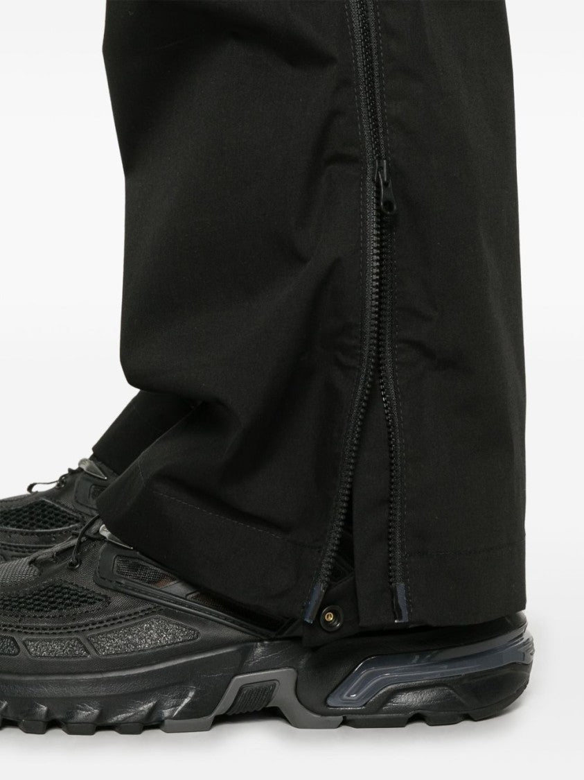 Gr10k Adjustable Black Pants With Concealed Fastenings And Zip Details