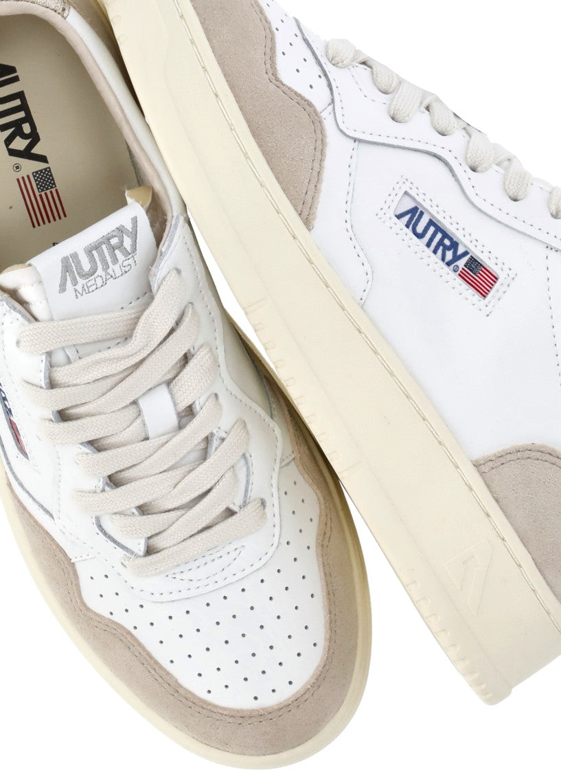 Autry White Smooth Leather Golden Accent Sneakers