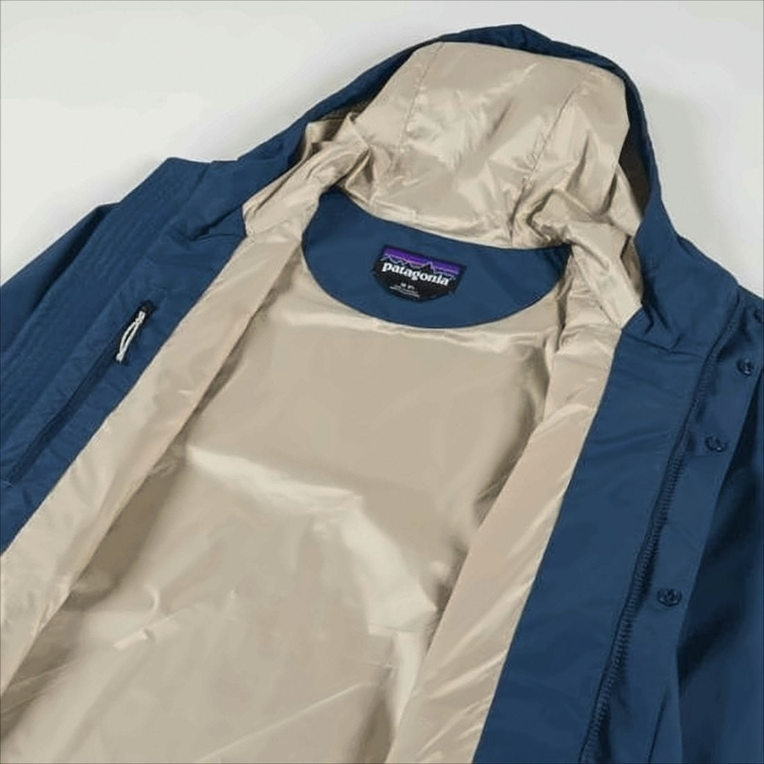 Patagonia Deep Blue Casual Jacket With Adjustable Hood And Functional Design