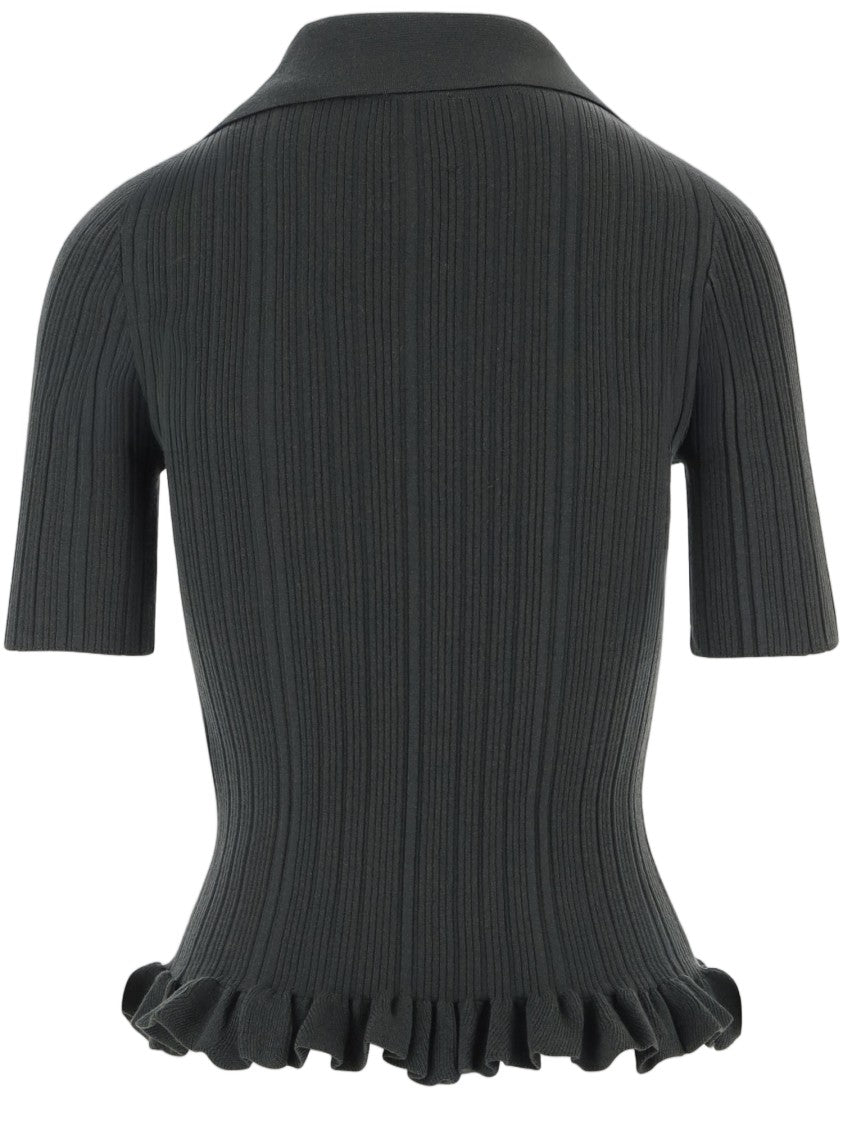 Patou Stretch Wool-Blend Sweater With Flap Pockets And Ruffled Hem