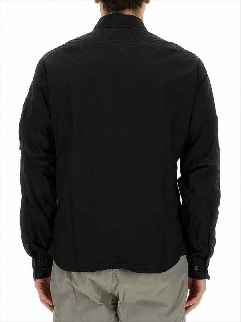 C.P. Company Minimalist Black Polyamide Jacket With Innovative Design Elements