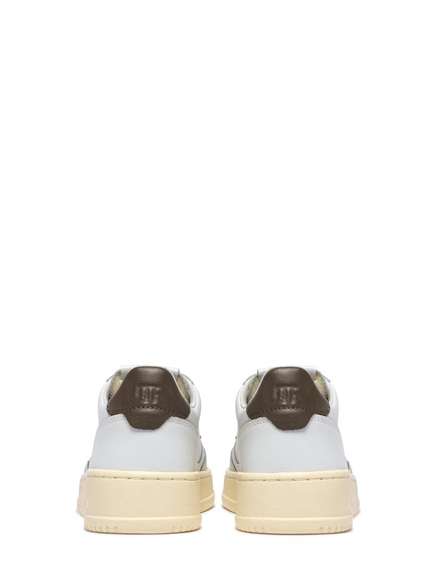 Autry Low-Top Sneakers With Perforated Detailing And Vintage Aesthetic