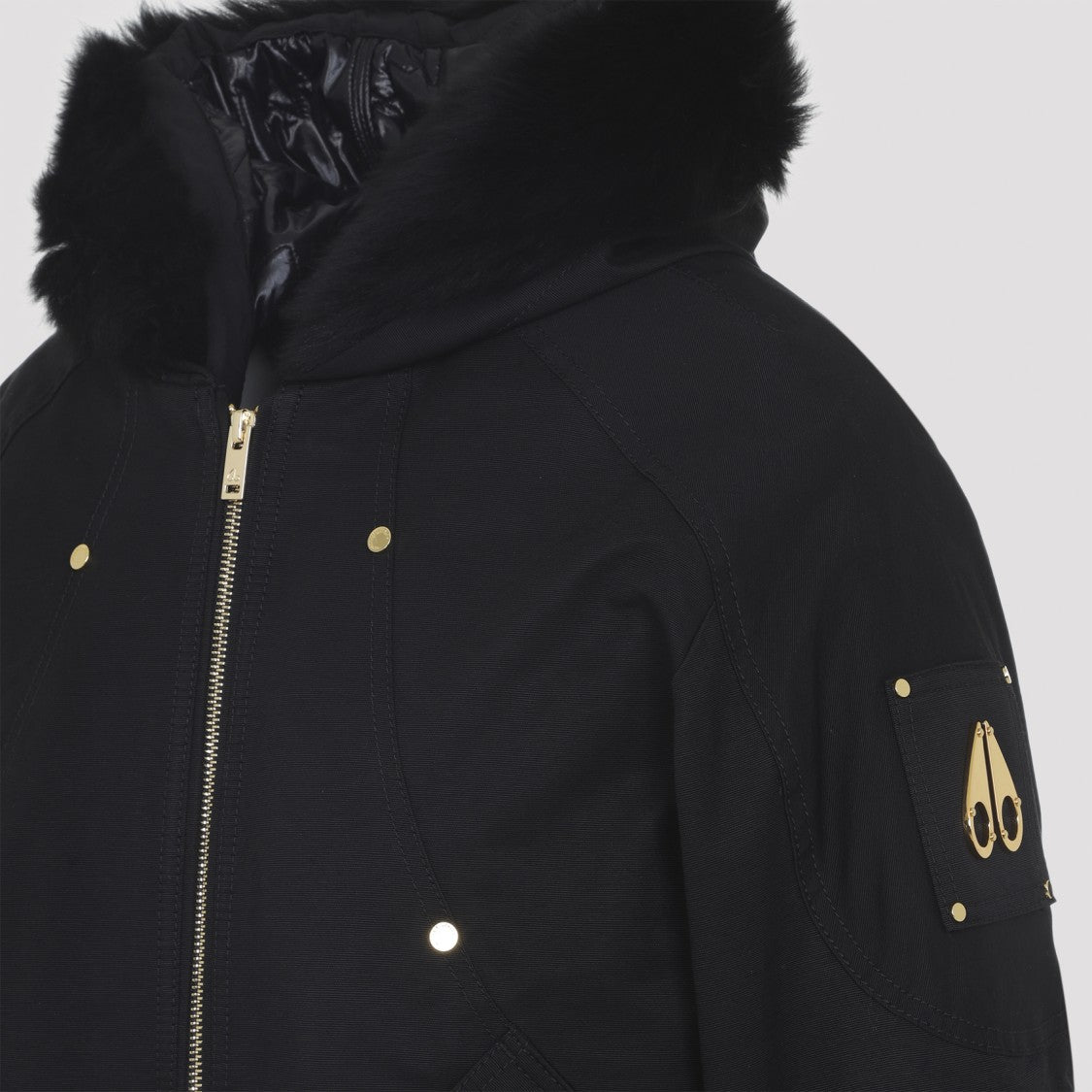 Moose Knuckles Fitted Hooded Jacket With Plush Fur Trim And Metallic Accents