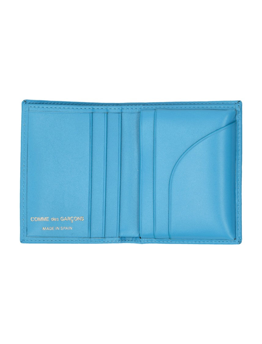Comme Des Garçons Bifold Wallet With Vibrant Blue Exterior
