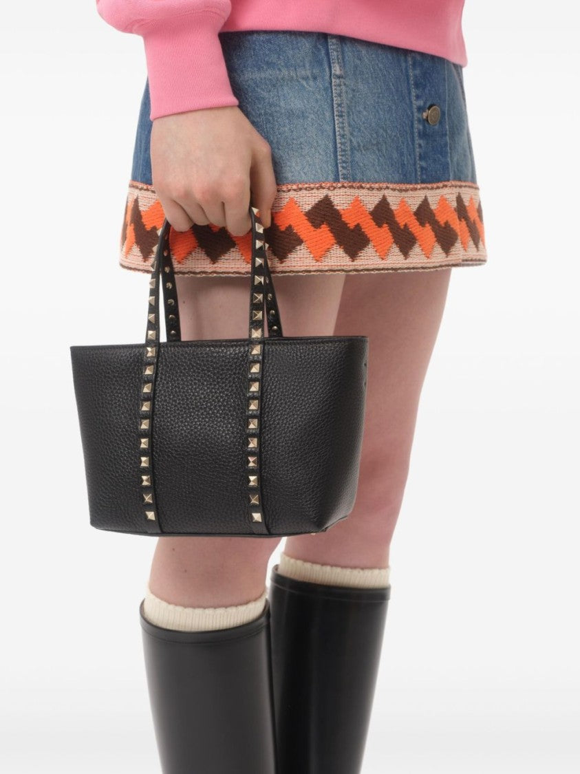 Valentino Garavani Textured Leather Handbag With Metallic Pyramid Studs