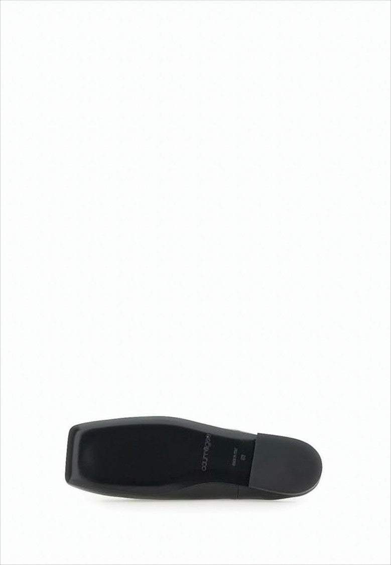 Courrèges Minimalist Black Lambskin Slip-On Mules With Embossed Detail