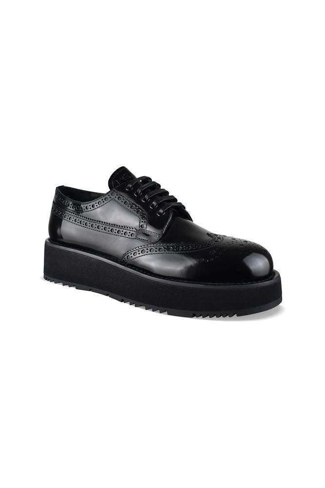 Prada Brogue Derby Shoes In Black Patent Leather