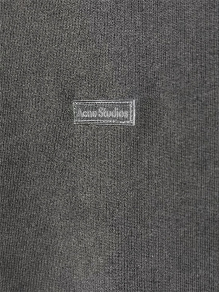 Acne Studios Oversized Drawstring Hoodie With Washed Texture And Subtle Logo Patch