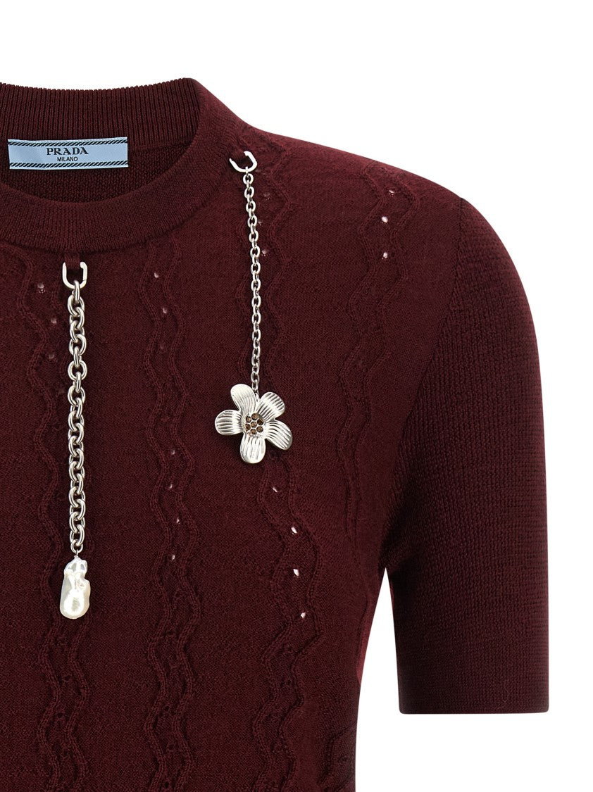 Prada Burgundy Virgin Wool Sweater With Distressed Front And Metal Charms