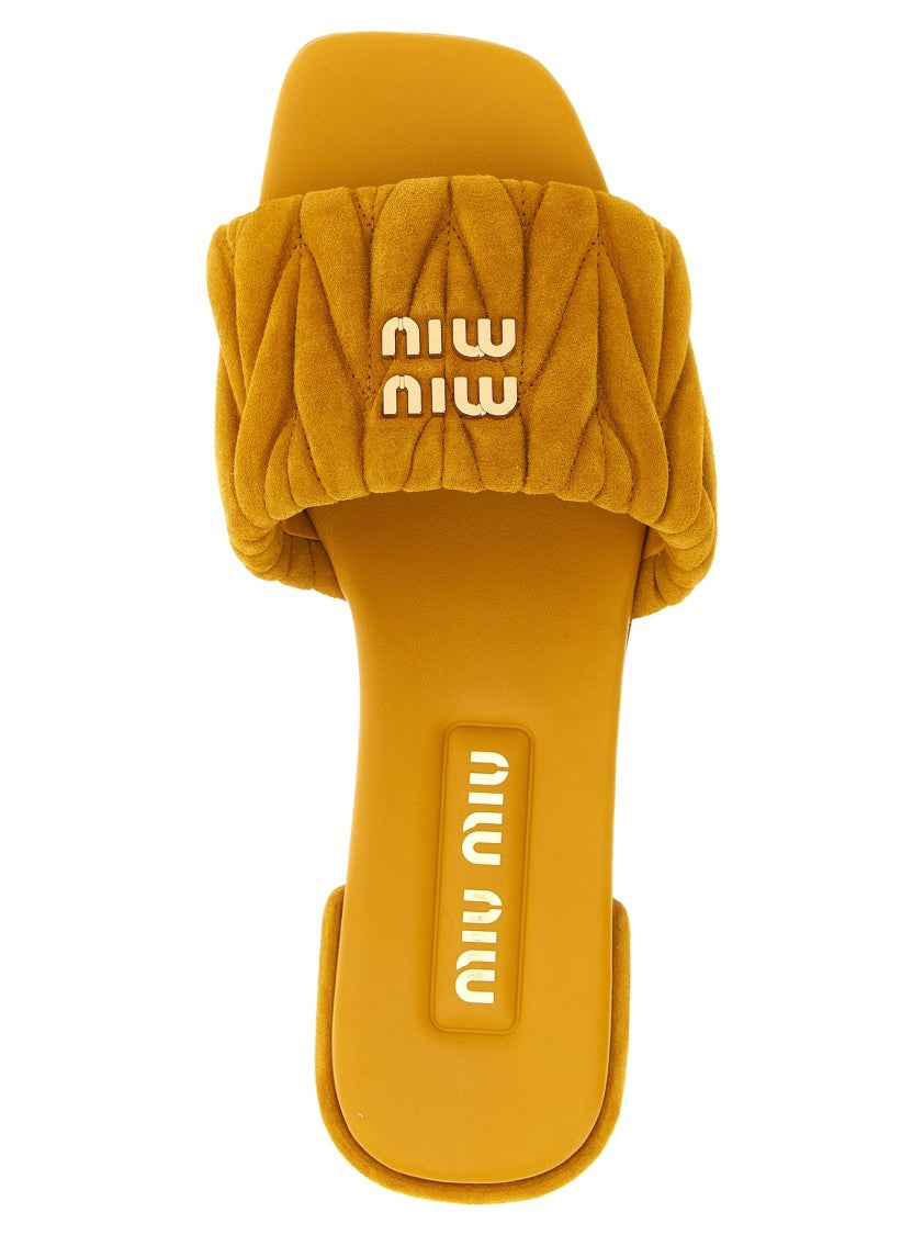 Miu Miu Matelassé Suede Slides