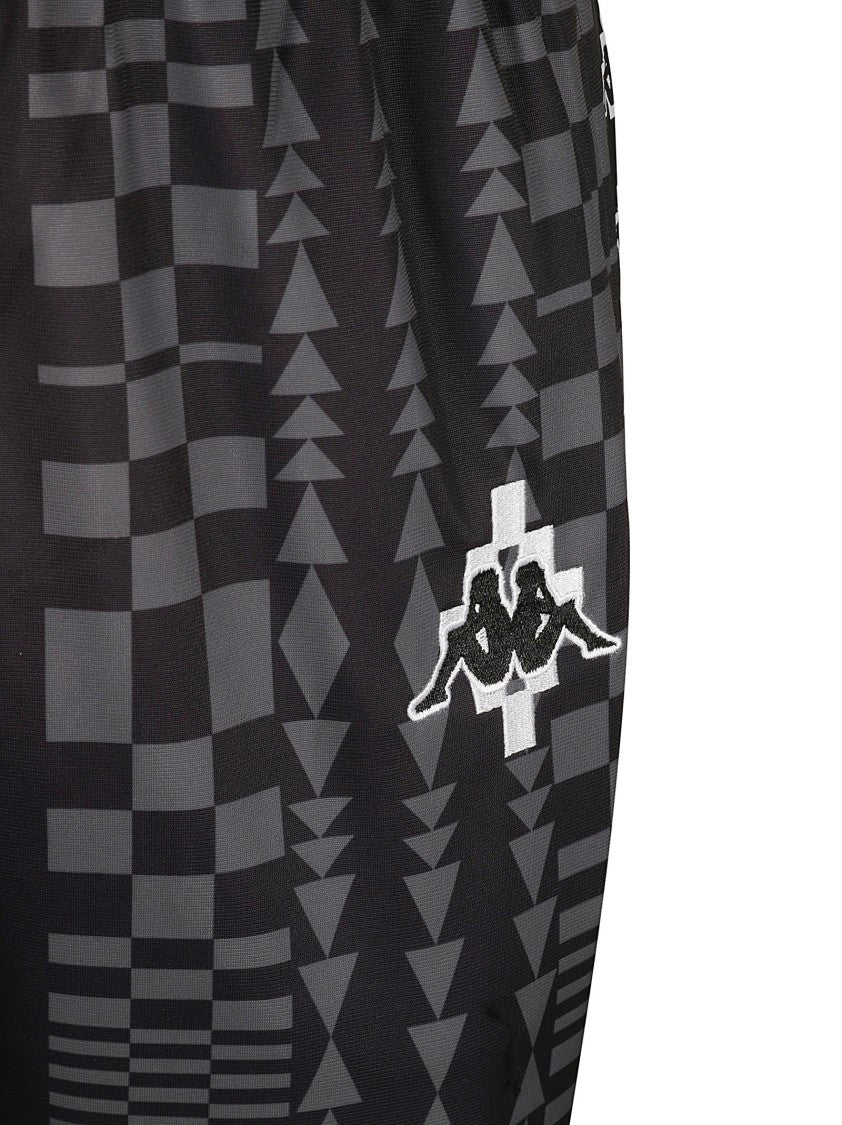 Marcelo Burlon Geometric Pattern Trousers With Tapered Legs