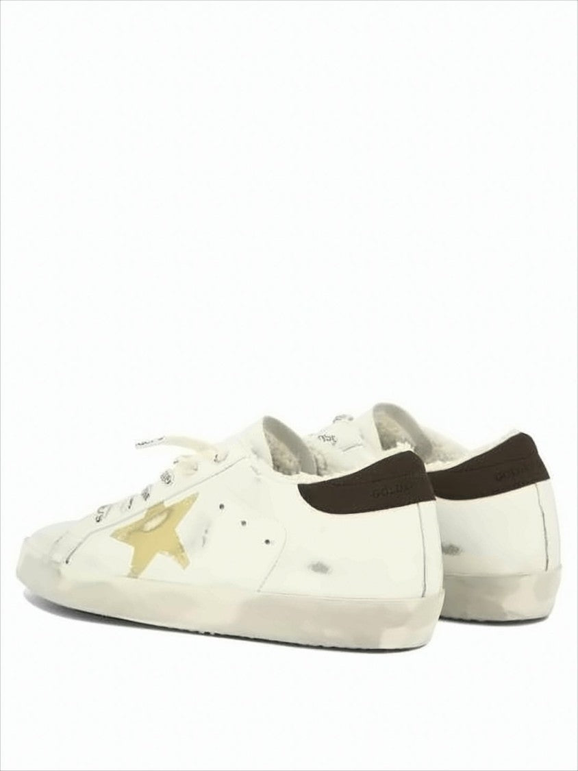 Golden Goose Distressed Leather Low-Top Sneakers With Iconic Star Emblem