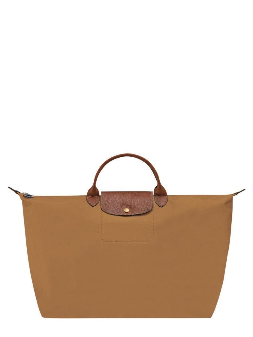 Longchamp Spacious Travel Bag With Structured Silhouette And Leather Accents