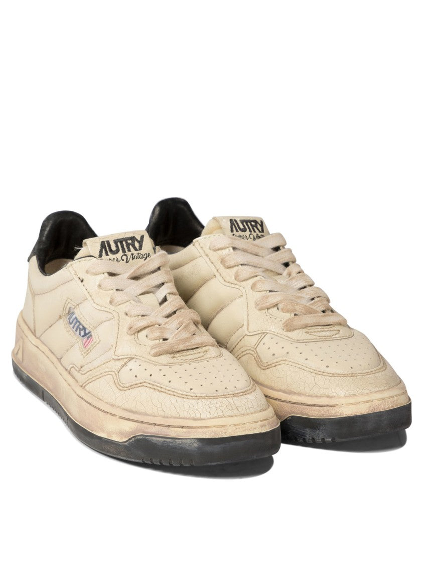 Autry Vintage-Inspired Leather Sneakers With Contrast Rubber Sole