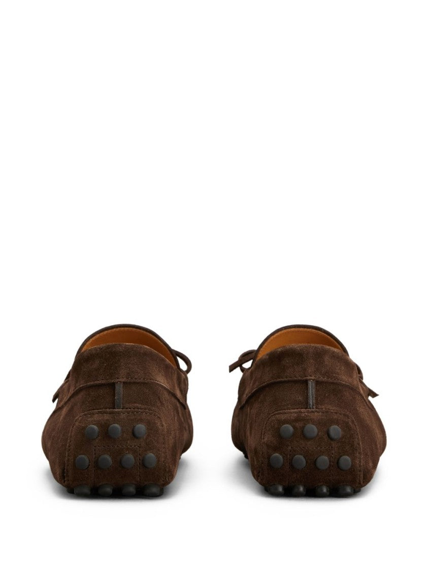 Tod's Moccasin Toe Loafers With Decorative Bow And Rubber Pebble Sole
