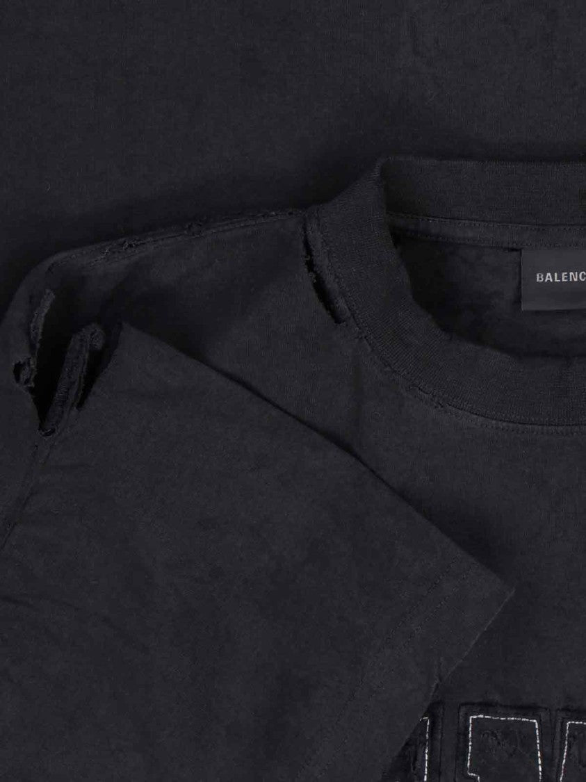 Balenciaga Distressed Black Cotton T-Shirt With Bold Logo