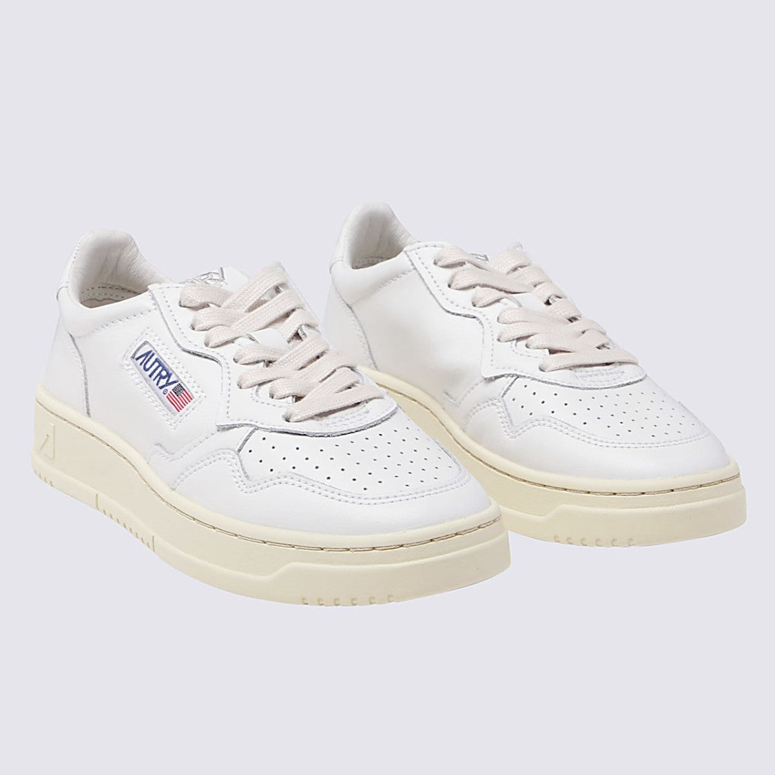 Autry Low-Top Sneakers With Perforated Detailing And Branded Patch